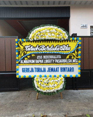 Papan Bunga Duka di Mantup